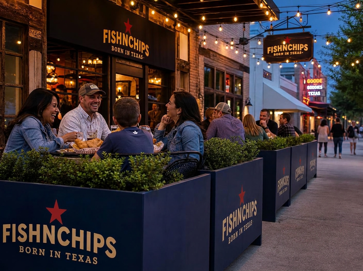 Sidewalk patio seating outside a downtown Texas FishNChips Destination location at golden hour
