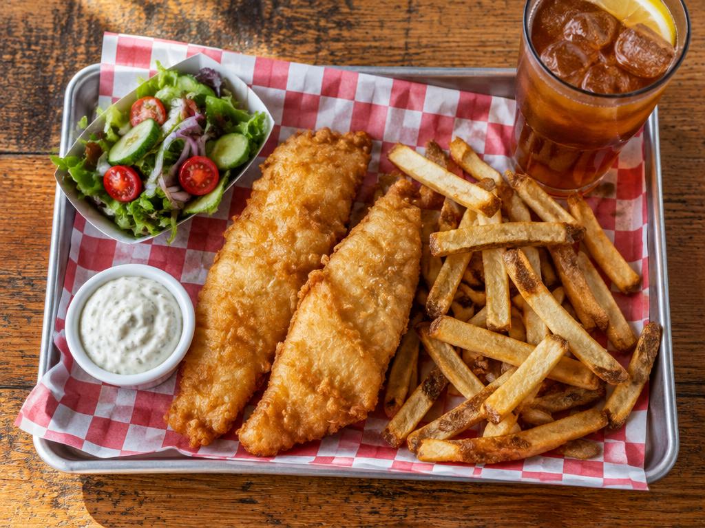 Two golden hand-battered fish fillets with hand-cut fries, fresh side salad and tartar sauce